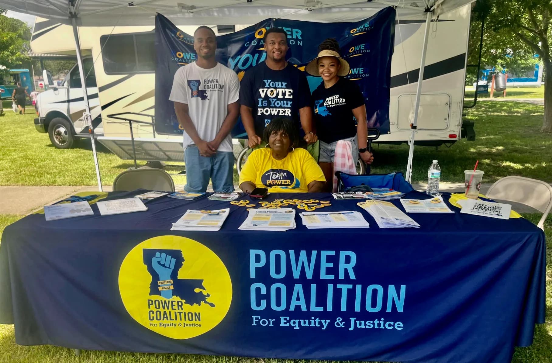 Photo: Power Coalition for Equity & Justice in Louisiana registering and engaging voters at a community event in June after the governor suspended congressional primary elections